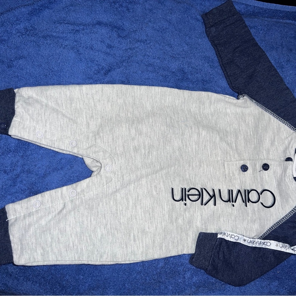 Calvin Klein Gray and Navy Baby Onesie